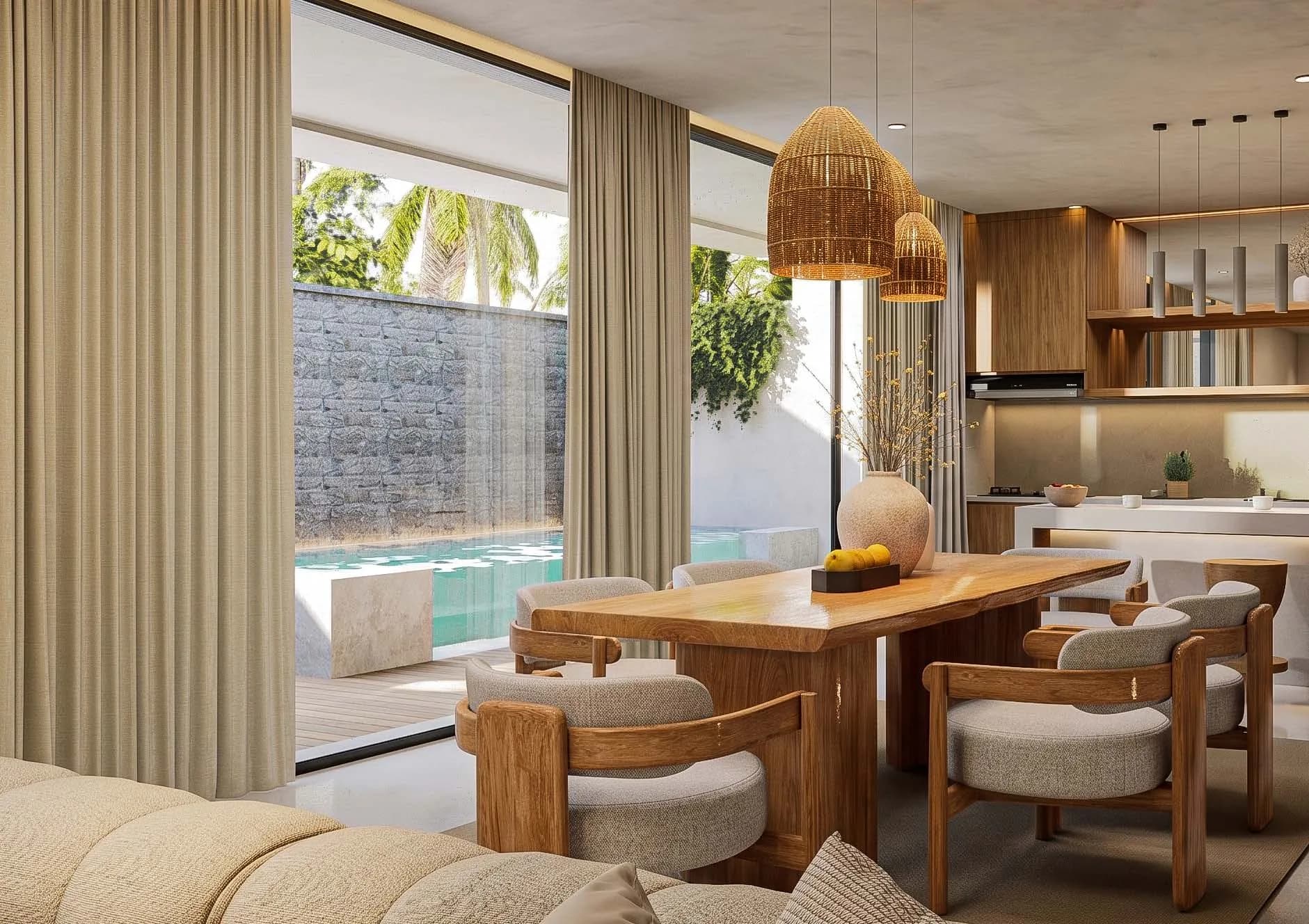 Pièce de vie et piscine privée d’une villa deux chambres premium